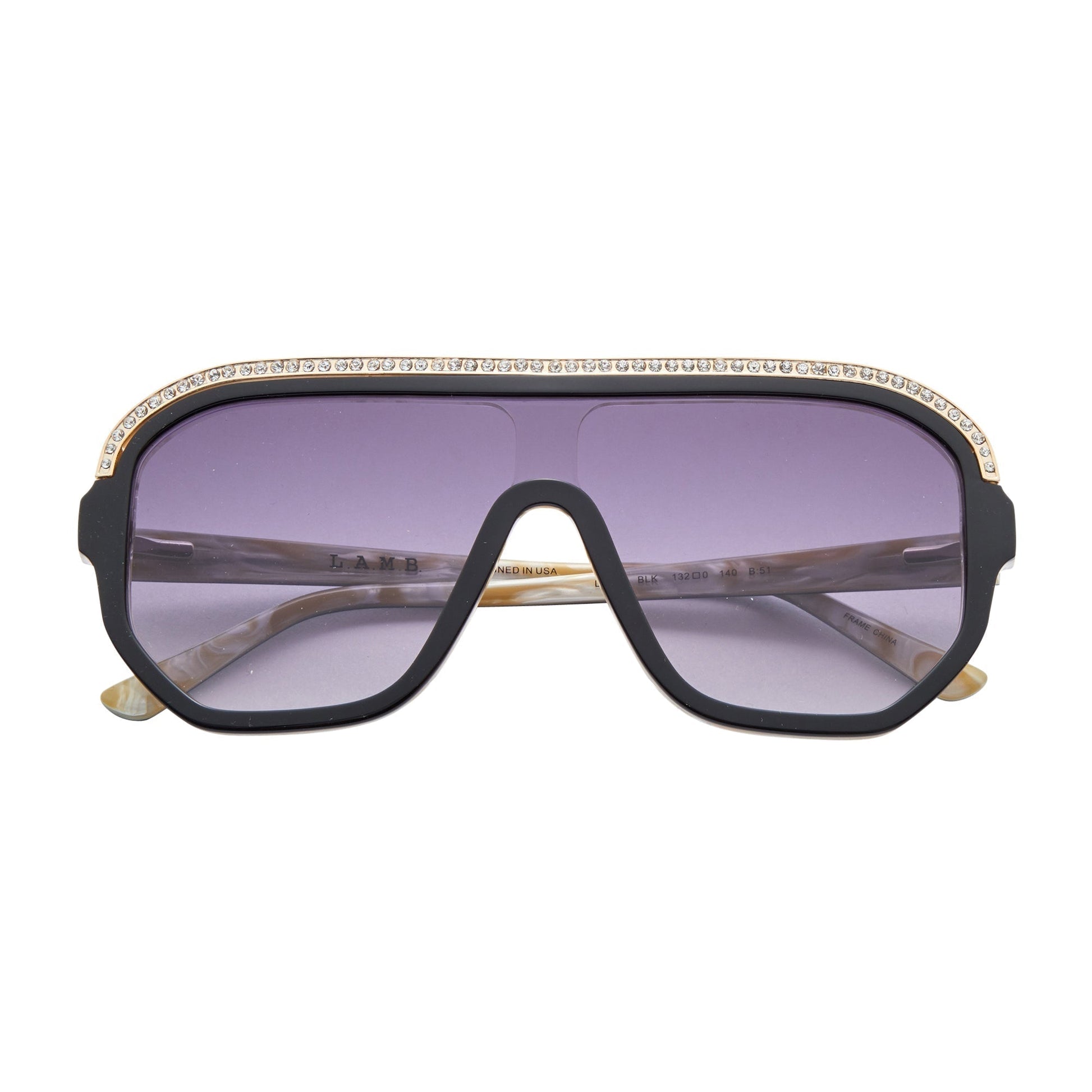 L.A.M.B. LA593 BLK Sunglasses shield-style with black and bone acetate, crystal inlays, gold details, and smoke fade lenses with UV400 protection