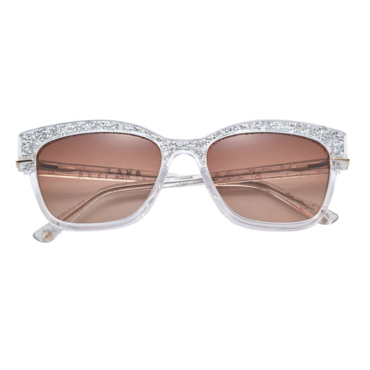 L.A.M.B. LA596 CRY Sunglasses crystal acetate frame with silver details and brown lenses UV400 protection