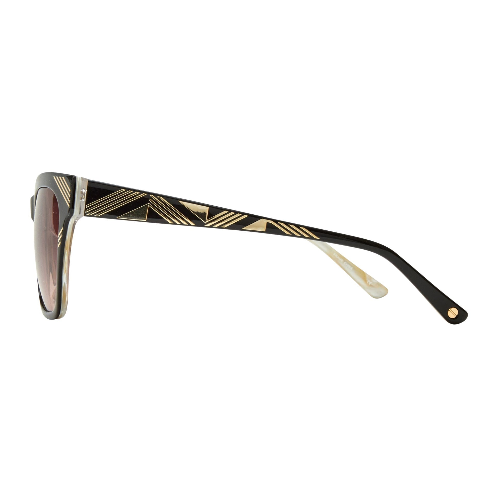 L.A.M.B. LA597 BLK Sunglasses side view with black and gold foil patterned arms and brown-to-smoke fade lenses, UV400 protection.