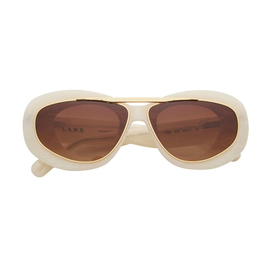 L.A.M.B. LA600 BON sunglasses with oval pearl marble acetate frame, gold double bridge, and brown gradient UV400 lenses