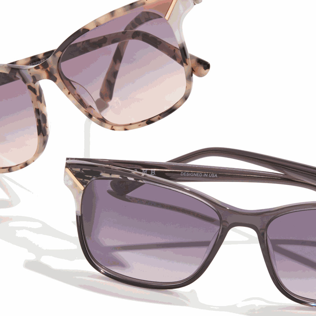 L.A.M.B. LA592 GRY Sunglasses with gray gradient lenses and acetate frames providing UV400 protection and modern street style.