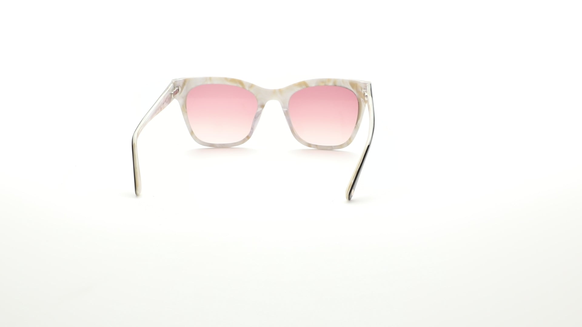 L.A.M.B. LA597 black sunglasses – bold square frame with gold geometric accents and pearl acetate temples, featuring gradient brown lenses. Designed by Gwen Stefani for standout style and UV protection. 360 view.