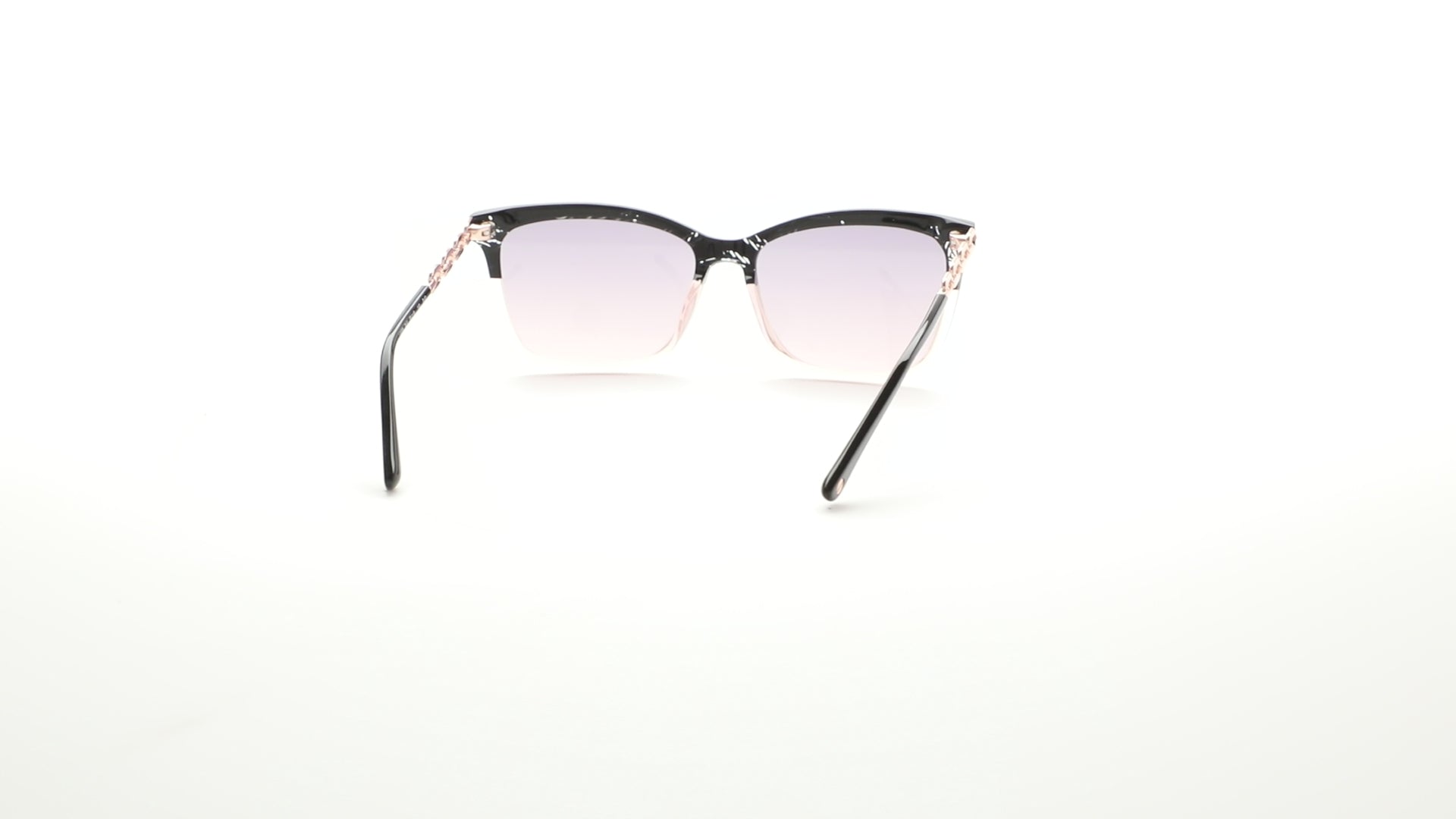 L.A.M.B. LA598 BLK sunglasses – chic cat-eye silhouette in glossy black and blush acetate with gradient gray lenses and rose gold chain-link temples, designed in the USA by Gwen Stefani. 360 view.