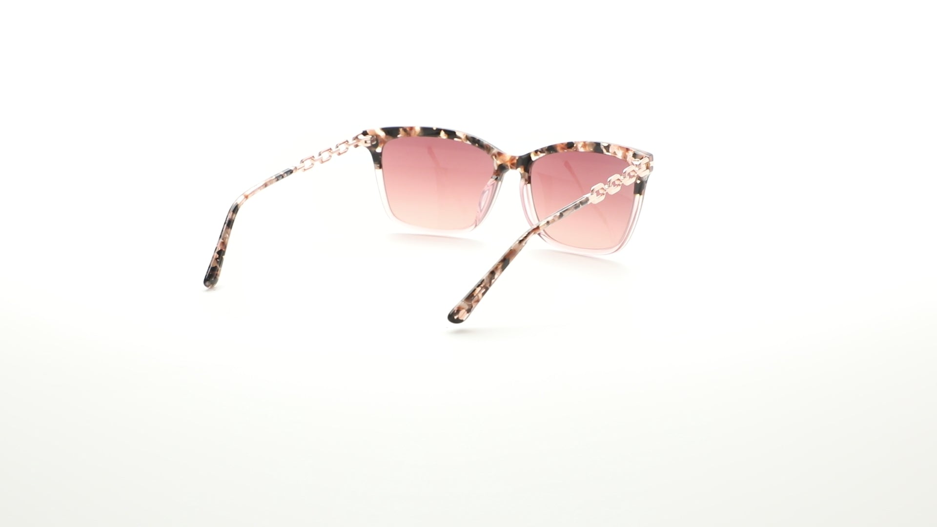 L.A.M.B. LA598 BLS sunglasses – modern cat-eye frames with tortoise and blush acetate blend, gradient brown lenses, and rose gold chain-link temples, designed in the USA by Gwen Stefani. 360 view.