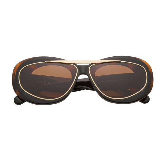 L.A.M.B. LA600 BLK sunglasses with black and tortoiseshell oval frame, gold double bridge, and brown UV400 lenses