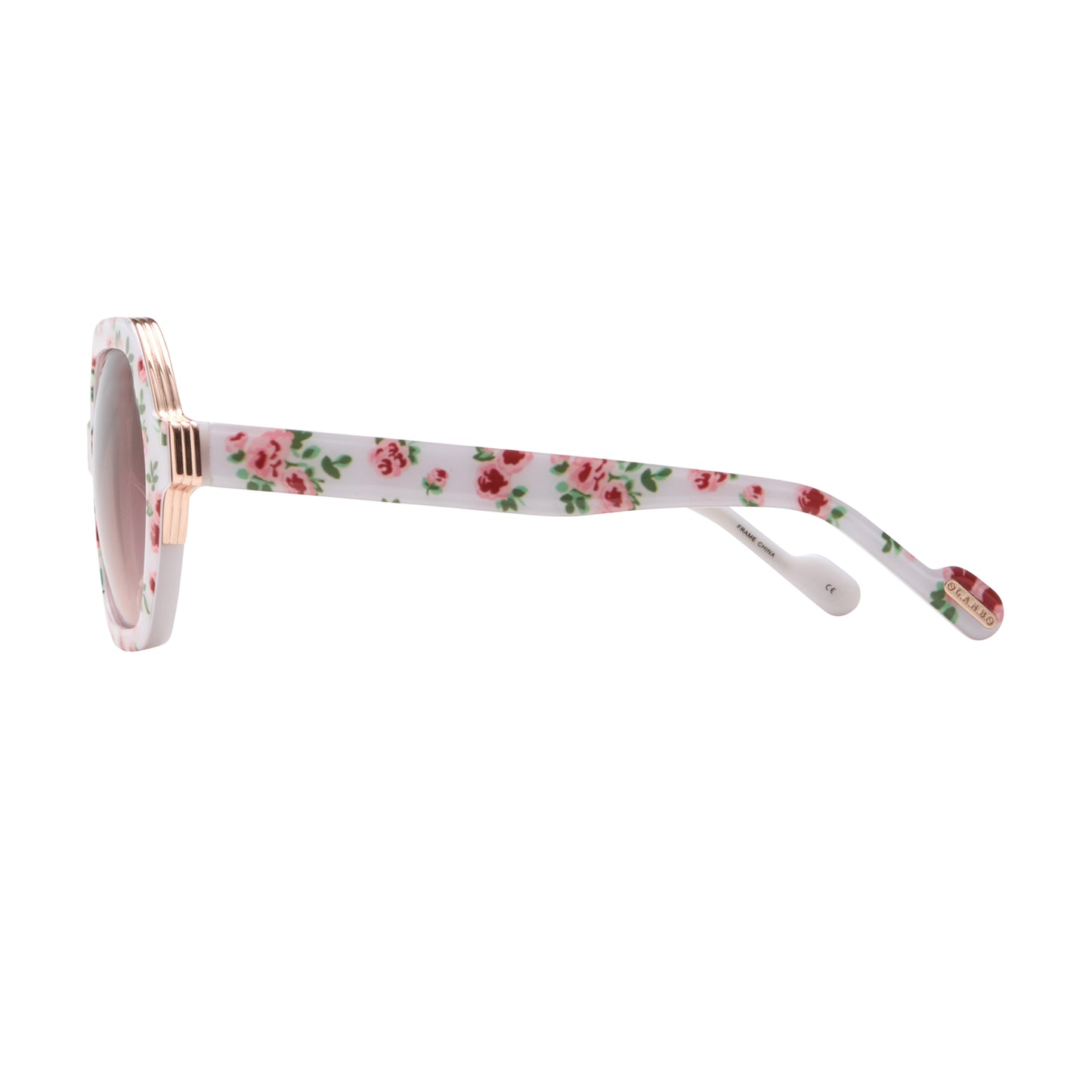 Side profile of L.A.M.B. LA601 WHT Sunglasses showing white floral acetate arms, gold accent at hinge, oversized frame design, burgundy gradient lenses.