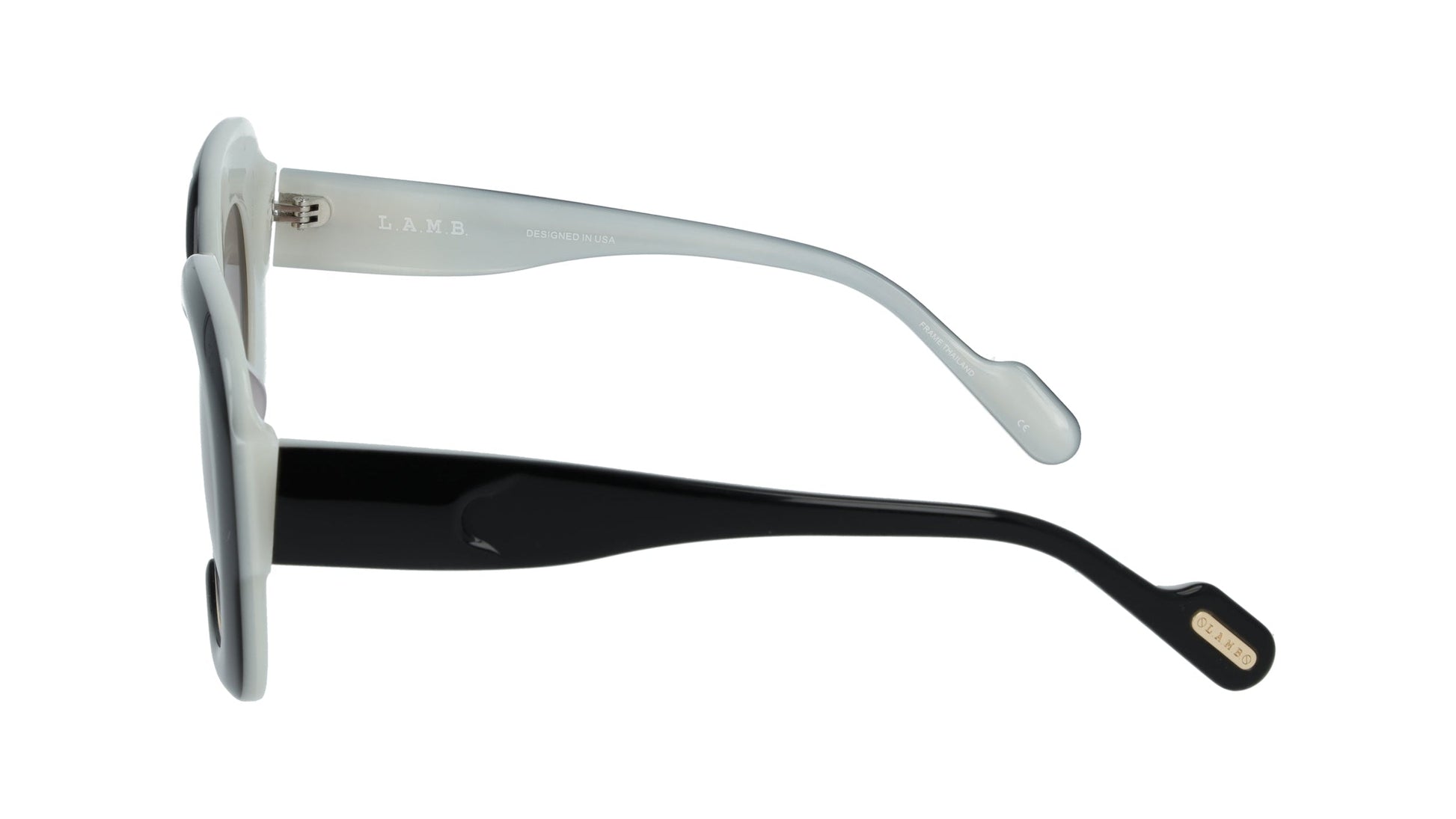 L.A.M.B. LA608 BLK Sunglasses with black over pearl acetate frame and brown fade UV400 lenses