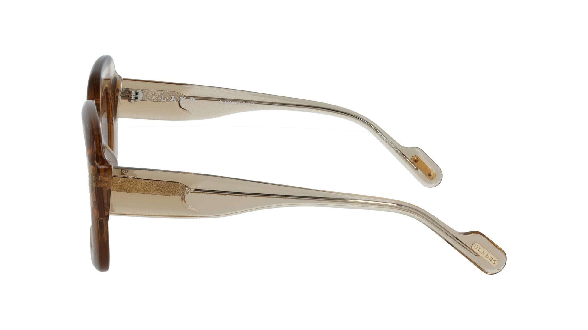 L.A.M.B. LA608 GLD Sunglasses with crystal gold acetate frame and brown lavender fade lenses offering UV400 protection.