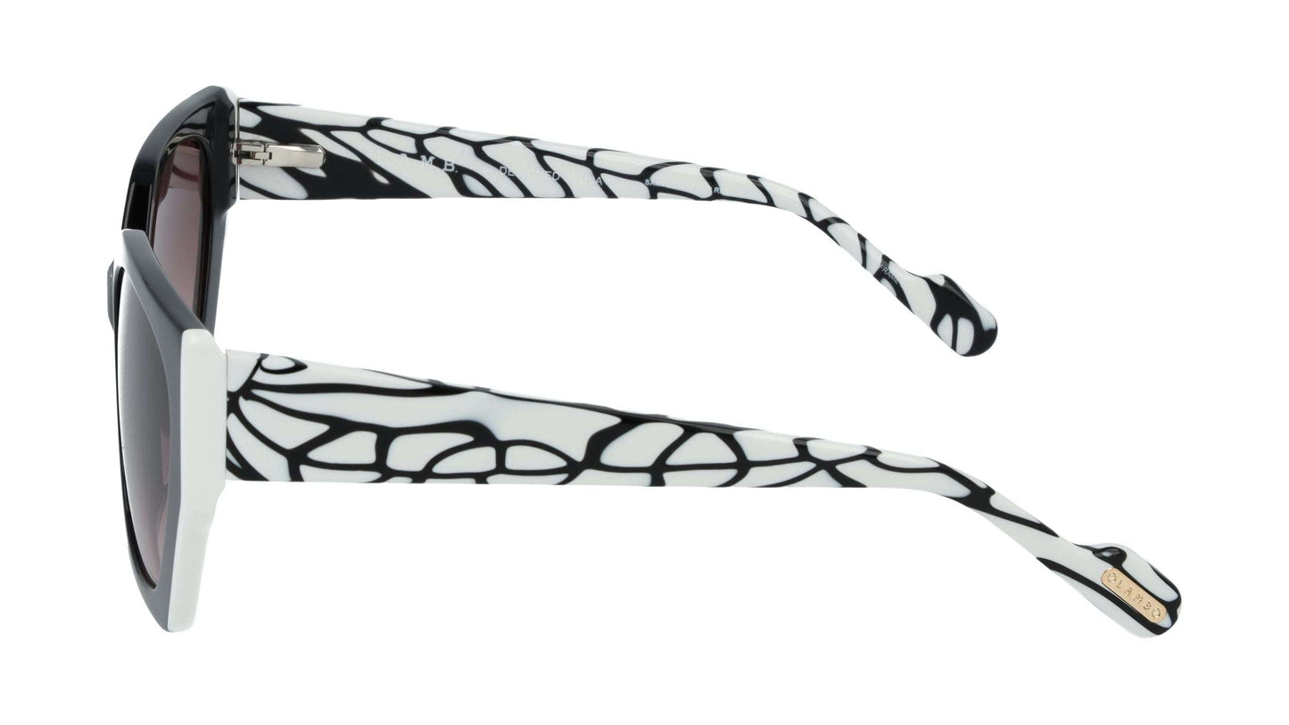 L.A.M.B. LA610 BLK Sunglasses Sunglasses with black and white patterned arms on a white background