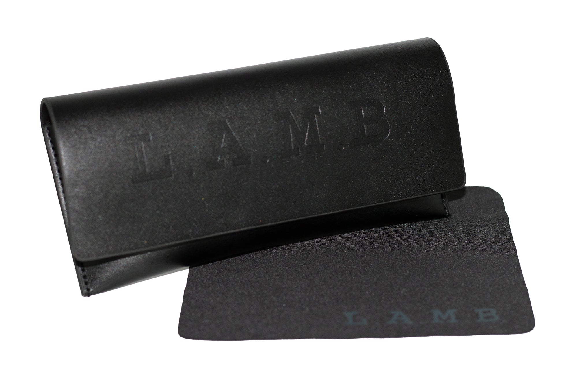 Black L.A.M.B. designer eyeglass case with embossed logo and matching branded cleaning cloth, perfect for stylish eyewear protection and storage.