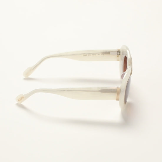 360 degree video of Pearl Marble sunglasses with brown gradient lenses on a white background